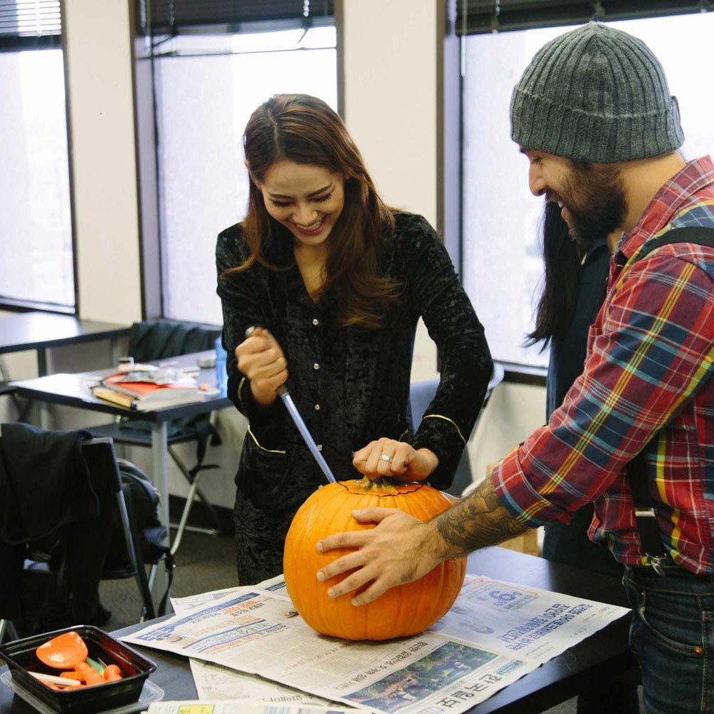 cwc-students-carving-pumpkin